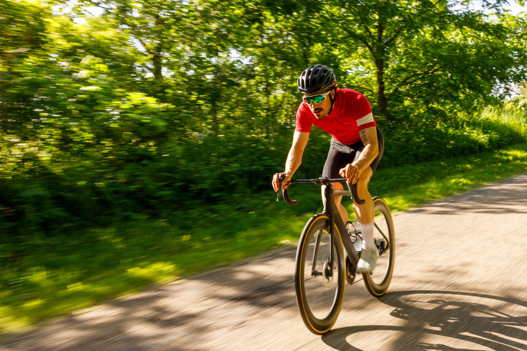 Man rides bike on in forest