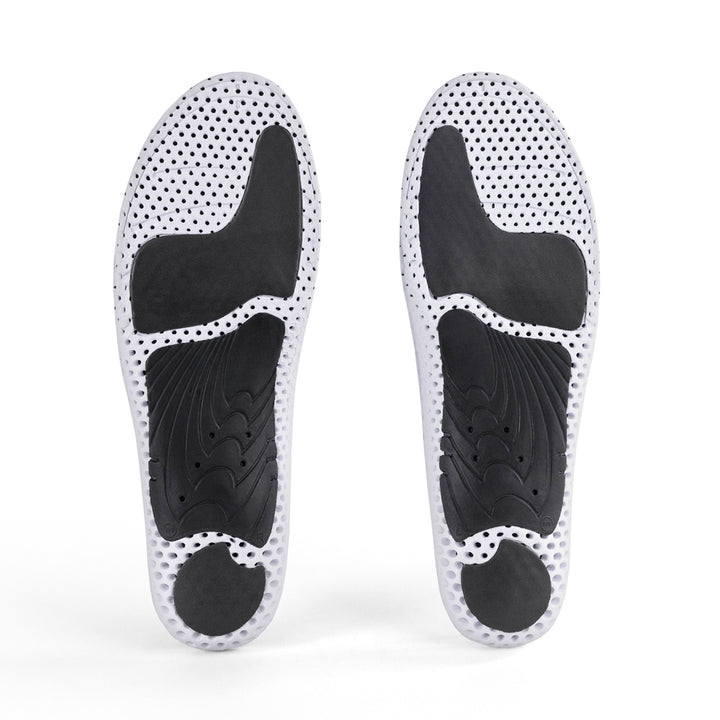 Base view of GOLFPRO low profile insole pair with black arch support, black heel pad, black forefoot cushioning pad, white and black base #1-wahle-dein-profil_low